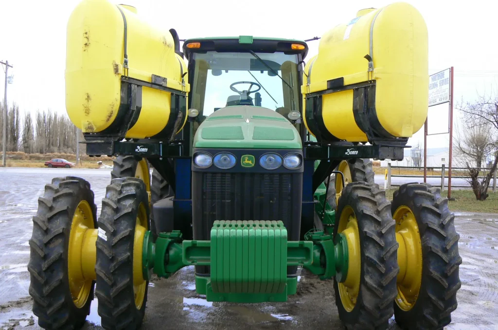 Tractor with front saddle tanks, front view